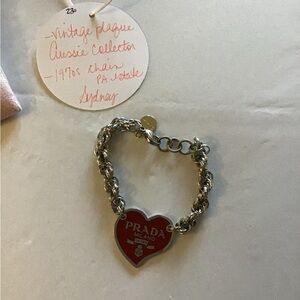 Idlewild Upcycled Jewelry Prada Silver Bracelet with Red Heart Charm.